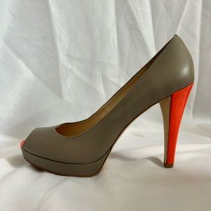 Gently worn, Calvin Klein leather heels with pop of orange on toe and heel